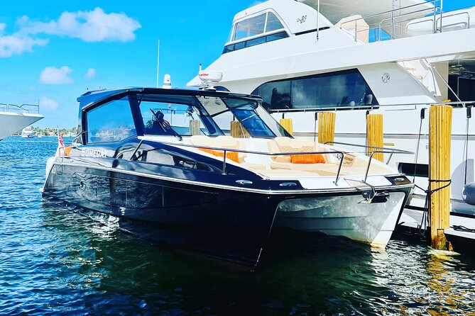 St. John Luxury Catamaran Turtle Snorkel and Cays Full Day - The Aquila power catamaran setup: shade, bathroom, and easy water access